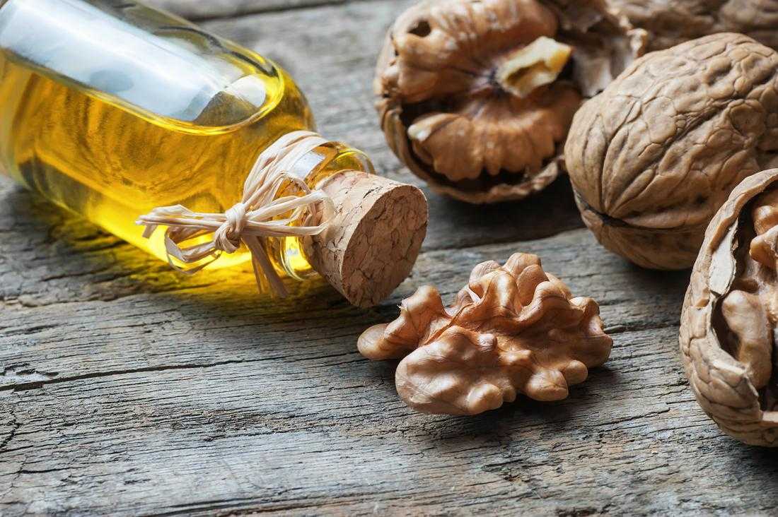 Масло грецкого ореха: польза и вред для организма, применение